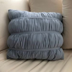 Decorative grey ruched pillow